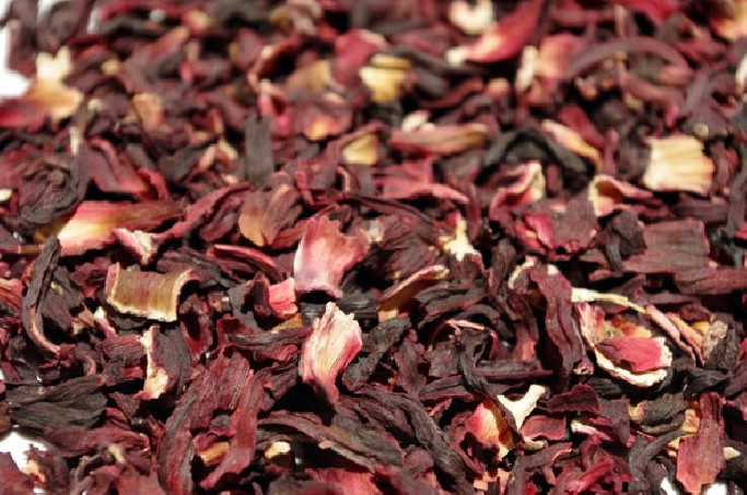 Infusion of Egyptian hibiscus flower offering a surprisingly pink liquor.