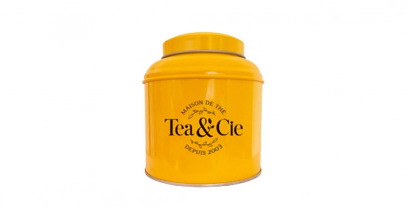 la fameuse petite boîte jaune de Tea & Cie pouvant contenir 100 g de thé ou d'infusion