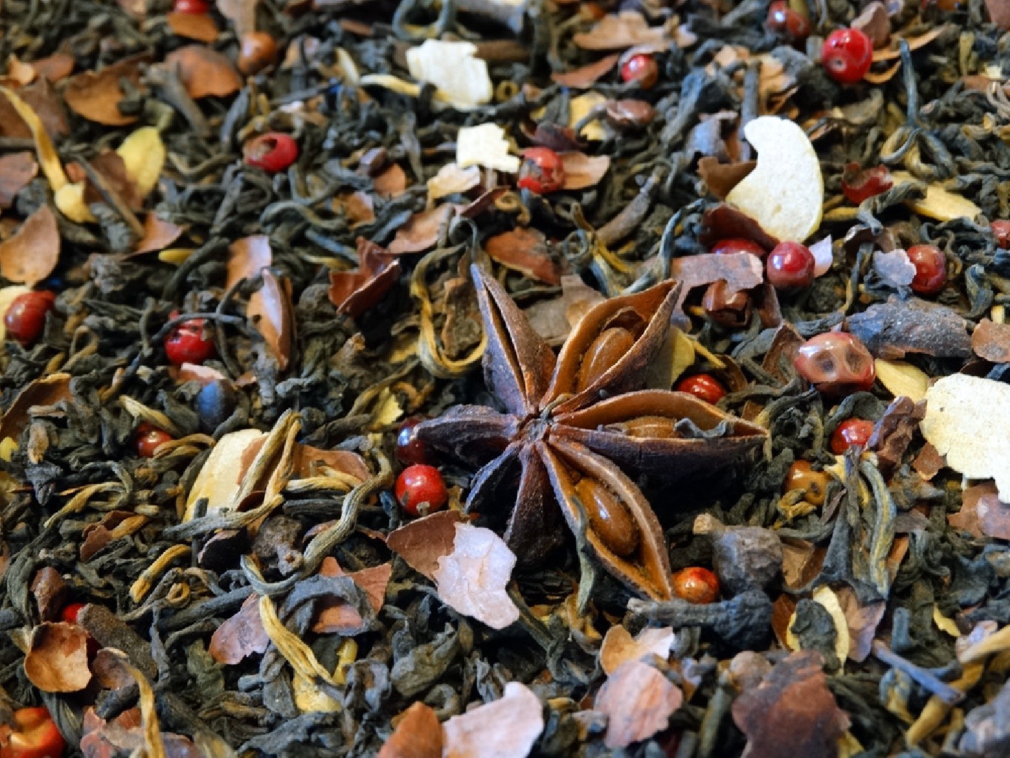 Pu er tea, cocoa beans, badians, berries and cinnamon